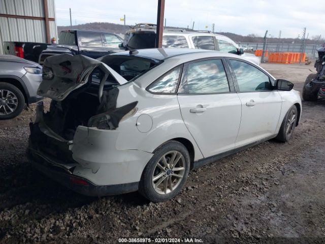 Photo 3 VIN: 1FADP3F21GL259277 - FORD FOCUS 