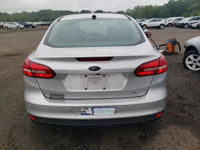 Photo 5 VIN: 1FADP3F21GL260932 - FORD FOCUS SE 