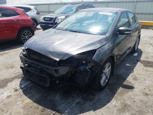 Photo 1 VIN: 1FADP3F21GL264592 - FORD FOCUS SE 