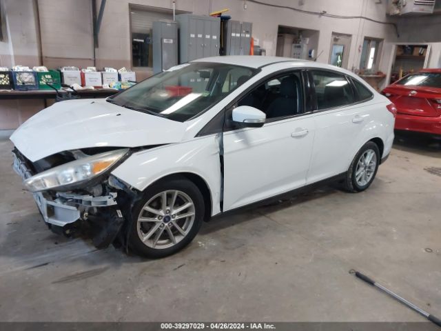 Photo 1 VIN: 1FADP3F21GL274409 - FORD FOCUS 