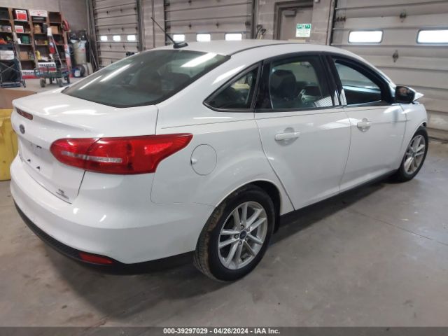 Photo 3 VIN: 1FADP3F21GL274409 - FORD FOCUS 