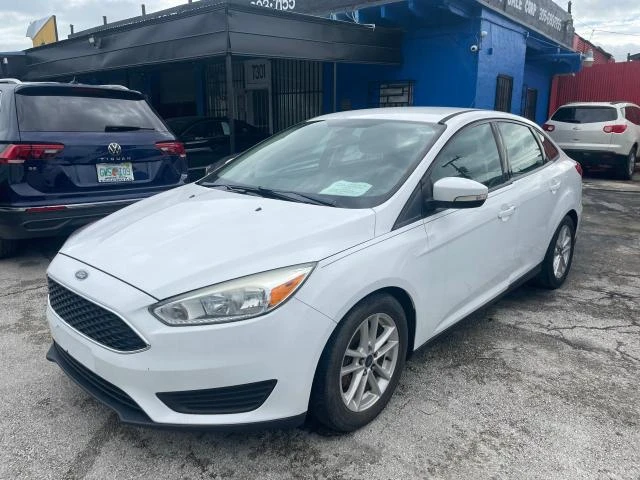 Photo 1 VIN: 1FADP3F21GL280632 - FORD FOCUS SE 