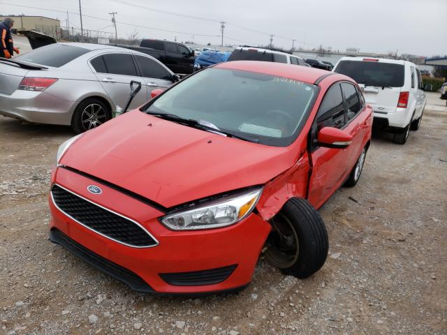 Photo 1 VIN: 1FADP3F21GL285586 - FORD FOCUS SE 