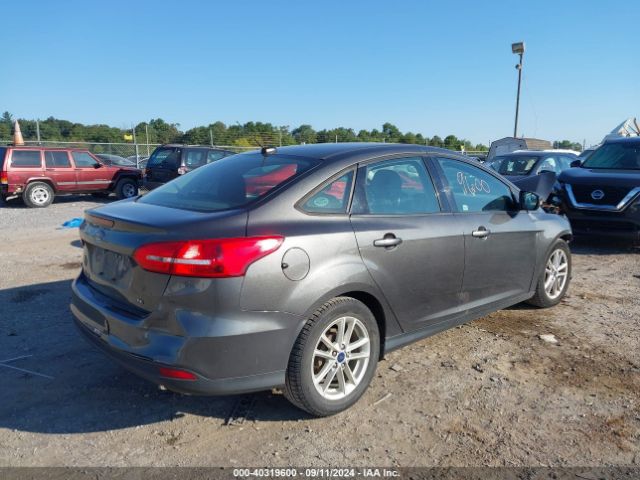 Photo 3 VIN: 1FADP3F21GL292358 - FORD FOCUS 