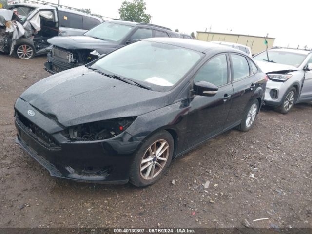 Photo 1 VIN: 1FADP3F21GL293235 - FORD FOCUS 