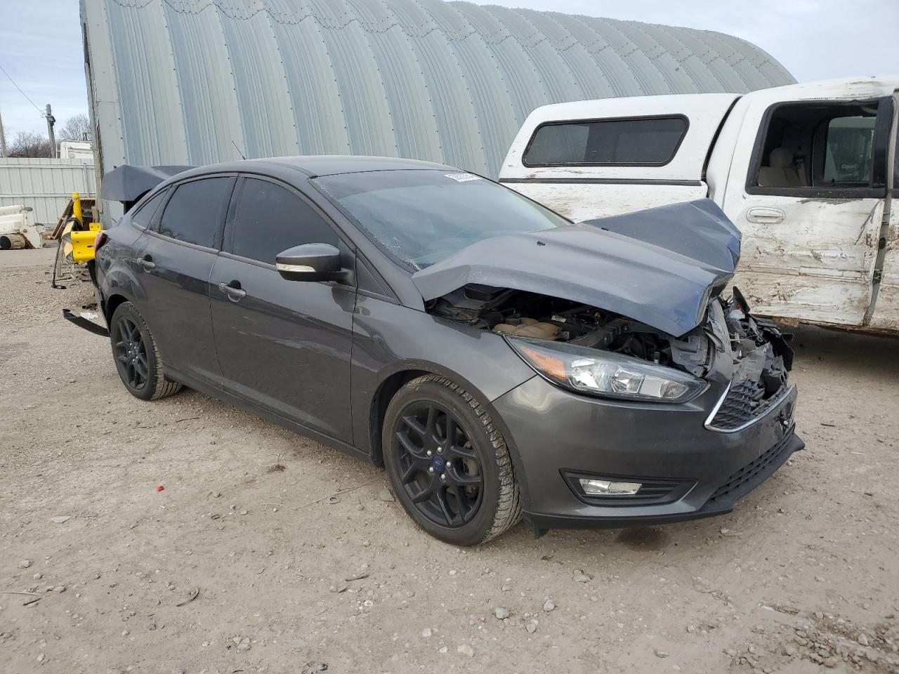 Photo 3 VIN: 1FADP3F21GL297091 - FORD FOCUS 