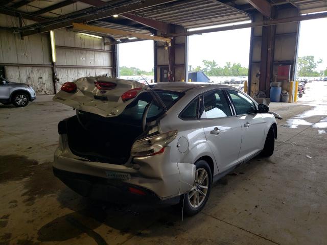 Photo 3 VIN: 1FADP3F21GL298175 - FORD FOCUS SE 