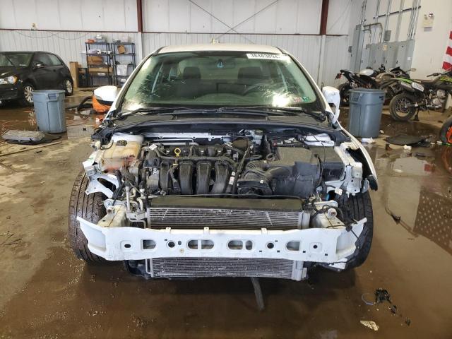 Photo 4 VIN: 1FADP3F21GL303035 - FORD FOCUS 