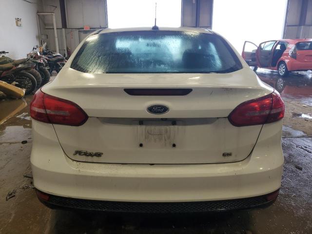 Photo 5 VIN: 1FADP3F21GL303035 - FORD FOCUS 