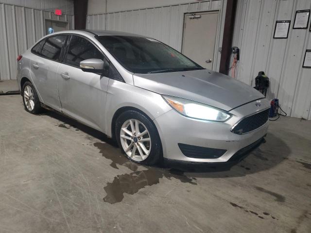 Photo 3 VIN: 1FADP3F21GL303228 - FORD FOCUS SE 