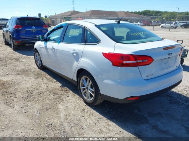 Photo 2 VIN: 1FADP3F21GL305240 - FORD FOCUS 