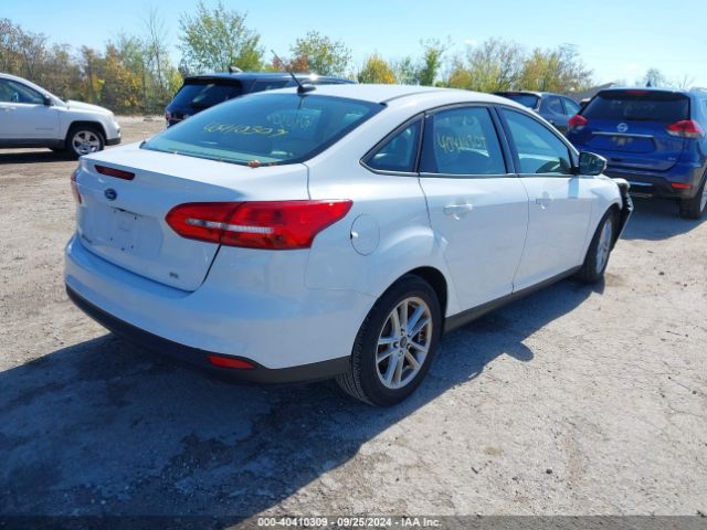 Photo 3 VIN: 1FADP3F21GL305240 - FORD FOCUS 