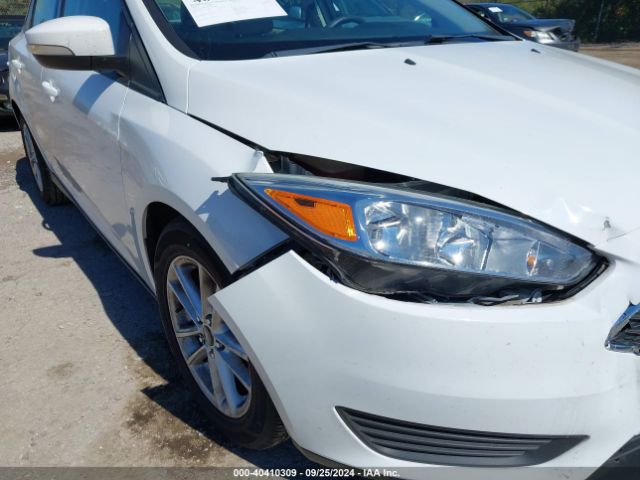 Photo 5 VIN: 1FADP3F21GL305240 - FORD FOCUS 