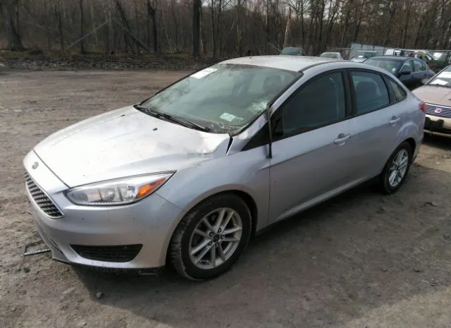 Photo 1 VIN: 1FADP3F21GL308011 - FORD FOCUS 