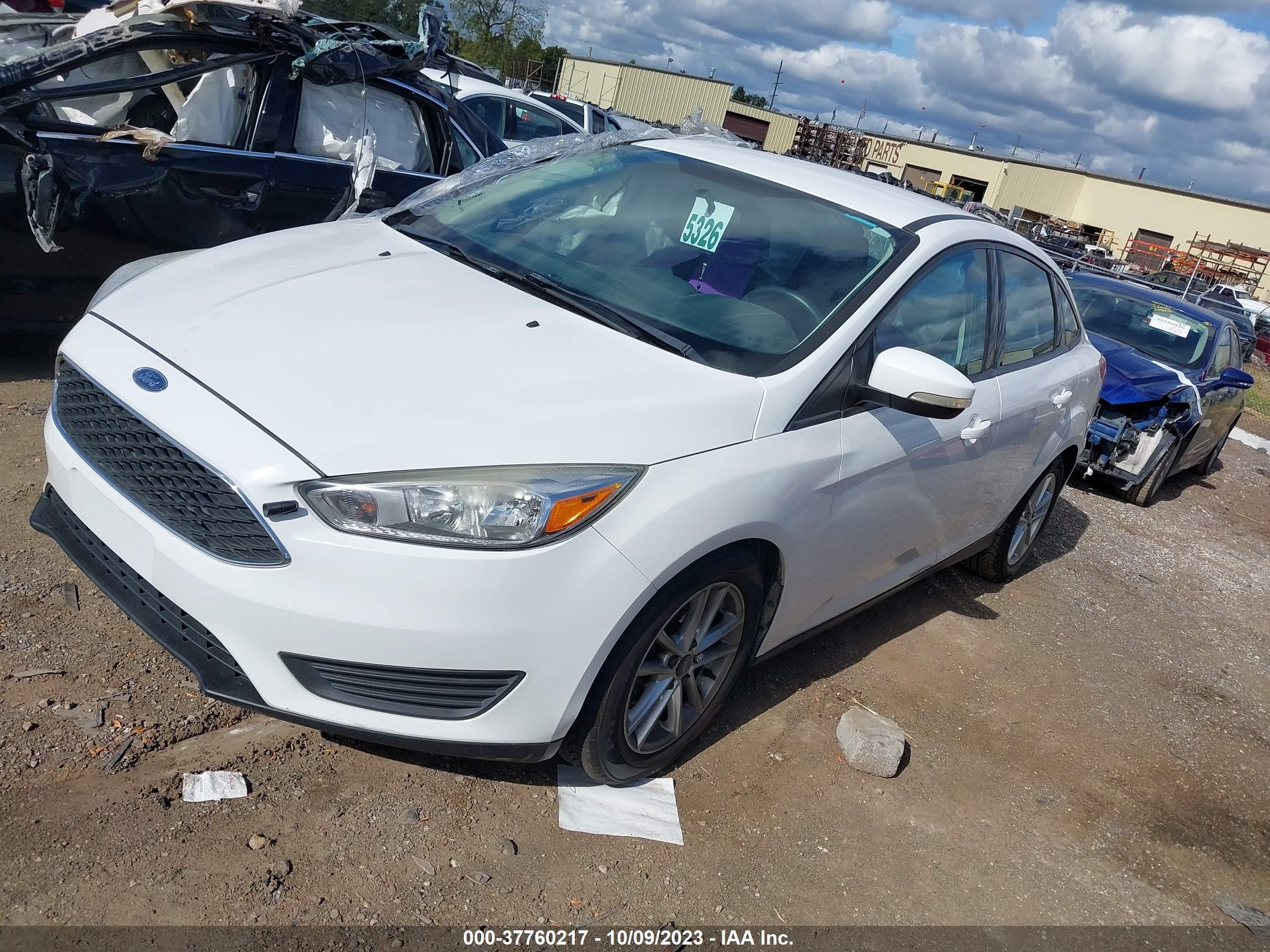 Photo 1 VIN: 1FADP3F21GL309787 - FORD FOCUS 