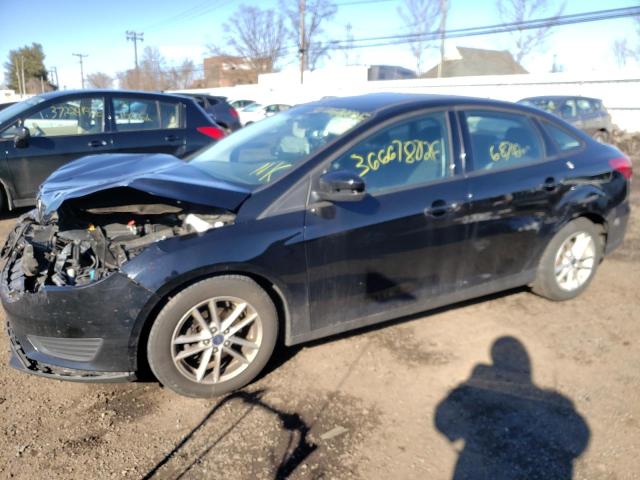 Photo 1 VIN: 1FADP3F21GL317856 - FORD FOCUS SE 