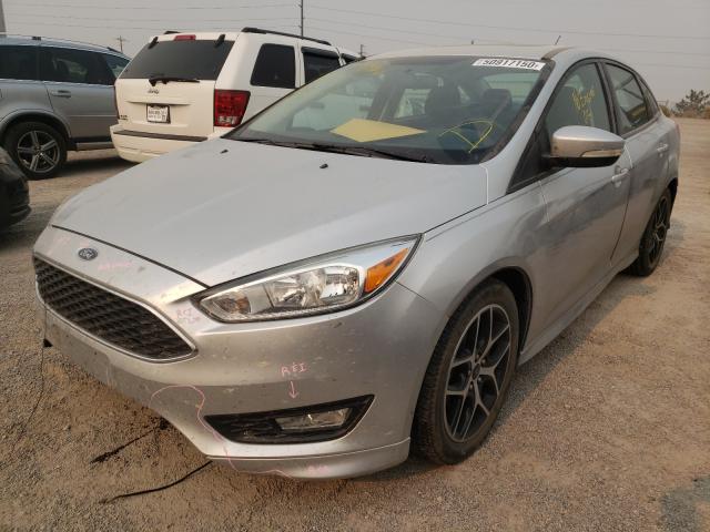 Photo 1 VIN: 1FADP3F21GL319459 - FORD FOCUS SE 