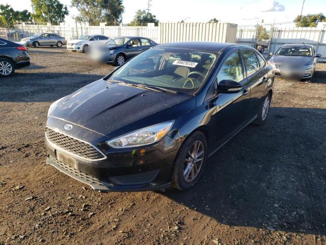 Photo 1 VIN: 1FADP3F21GL351375 - FORD FOCUS SE 