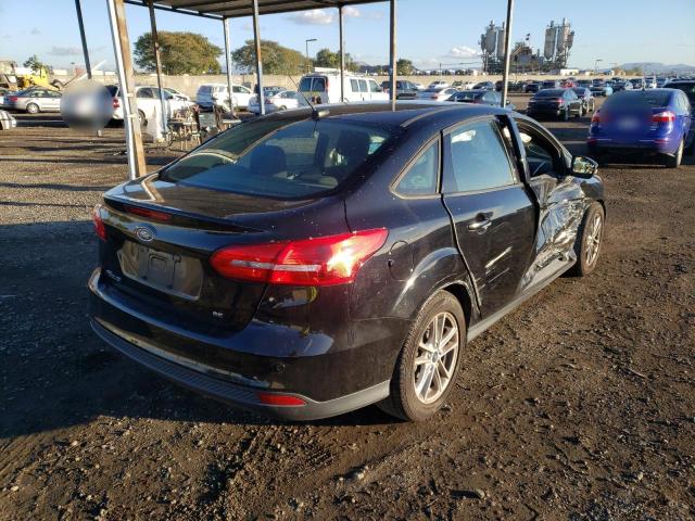 Photo 3 VIN: 1FADP3F21GL351375 - FORD FOCUS SE 