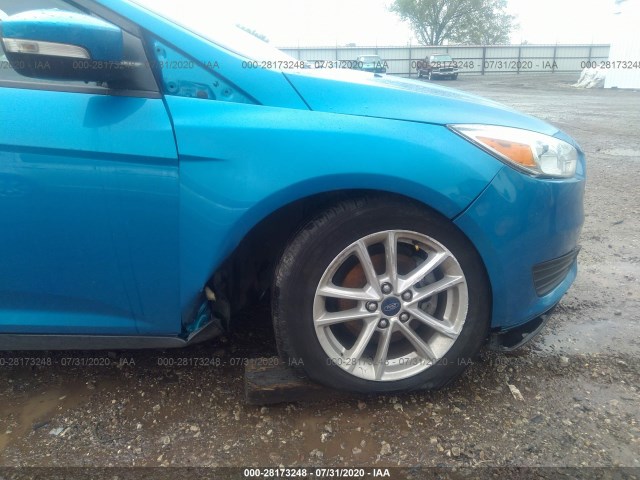 Photo 5 VIN: 1FADP3F21GL356088 - FORD FOCUS 