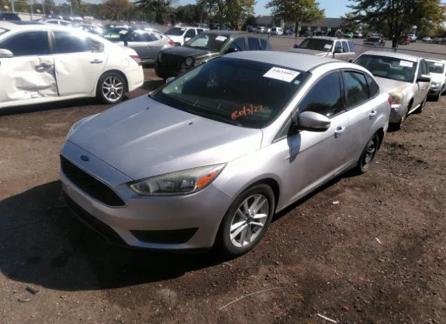 Photo 1 VIN: 1FADP3F21GL376051 - FORD FOCUS 