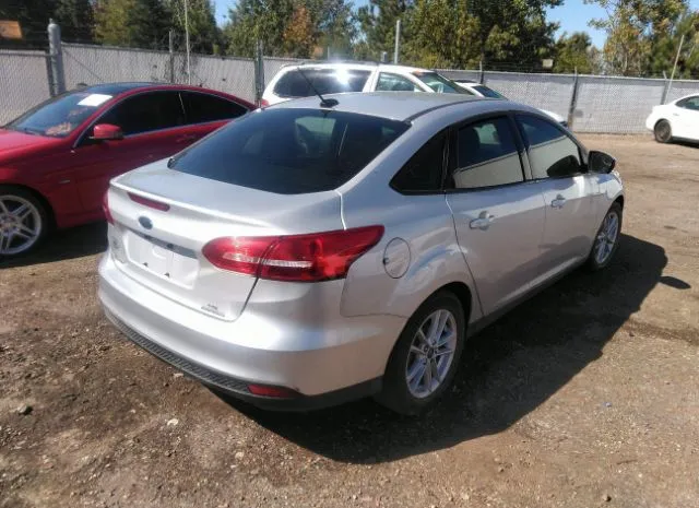 Photo 3 VIN: 1FADP3F21GL376051 - FORD FOCUS 