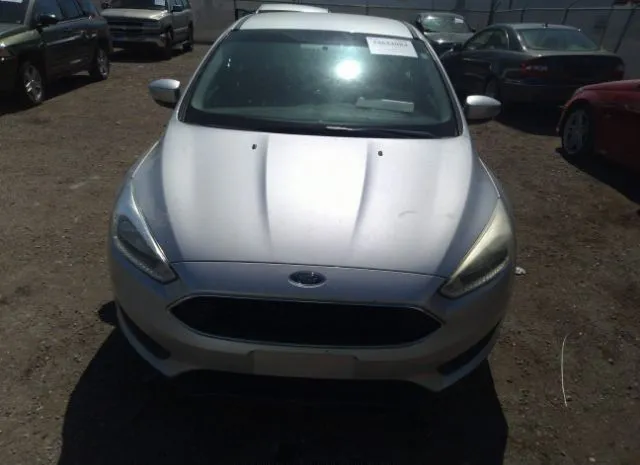 Photo 5 VIN: 1FADP3F21GL376051 - FORD FOCUS 