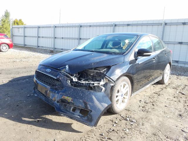 Photo 1 VIN: 1FADP3F21GL378740 - FORD FOCUS SE 