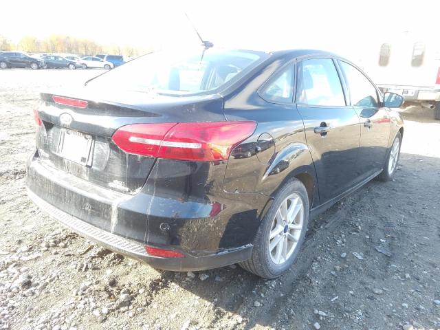 Photo 3 VIN: 1FADP3F21GL378740 - FORD FOCUS SE 