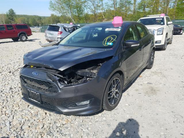 Photo 1 VIN: 1FADP3F21GL381170 - FORD FOCUS SE 