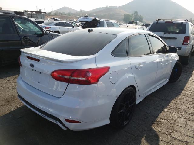 Photo 3 VIN: 1FADP3F21GL383937 - FORD FOCUS SE 