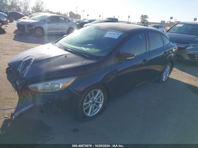 Photo 1 VIN: 1FADP3F21GL384084 - FORD FOCUS 