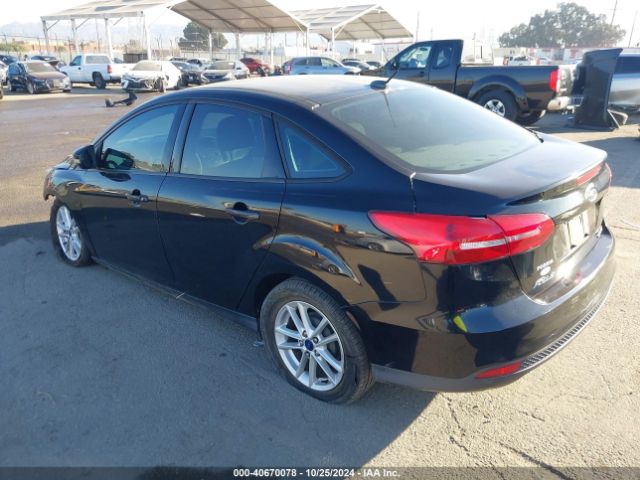 Photo 2 VIN: 1FADP3F21GL384084 - FORD FOCUS 