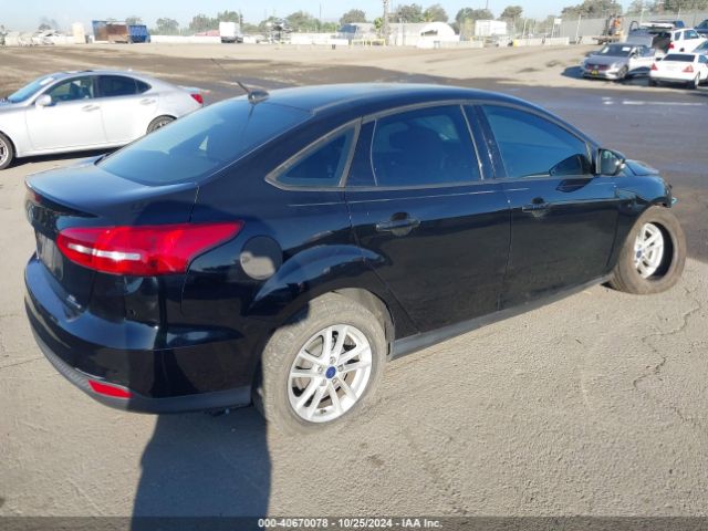 Photo 3 VIN: 1FADP3F21GL384084 - FORD FOCUS 