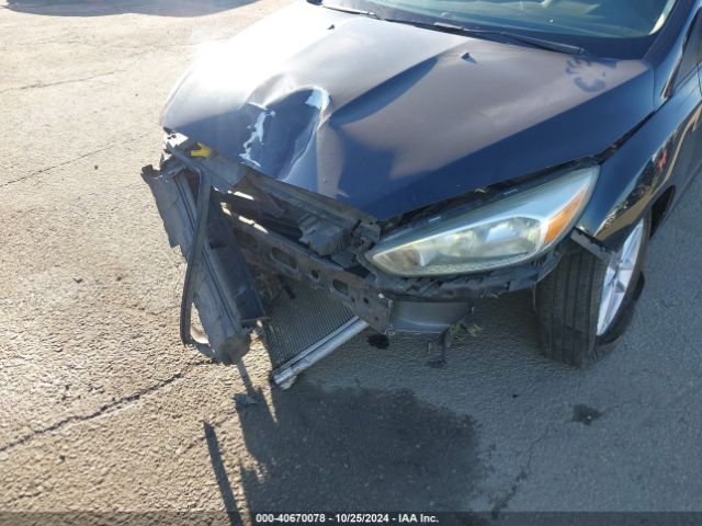 Photo 5 VIN: 1FADP3F21GL384084 - FORD FOCUS 