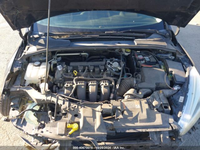 Photo 9 VIN: 1FADP3F21GL384084 - FORD FOCUS 