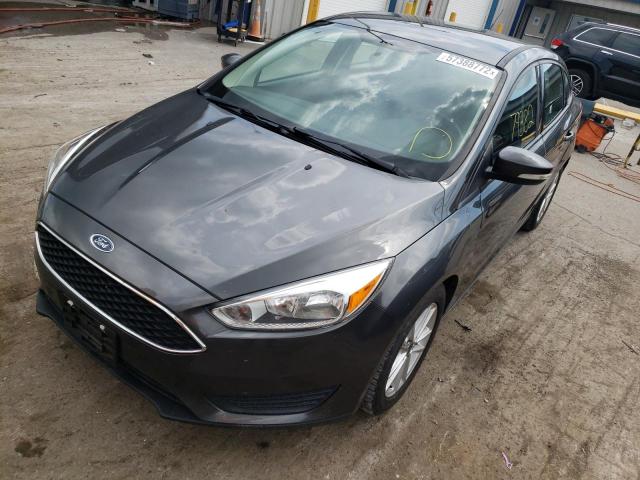 Photo 1 VIN: 1FADP3F21GL384554 - FORD FOCUS SE 