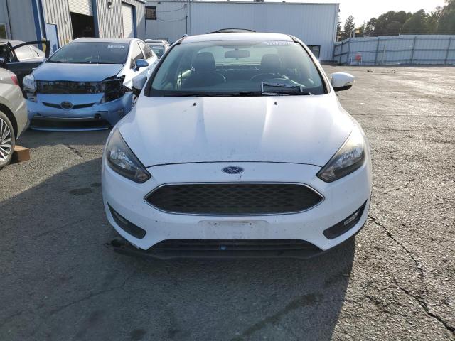 Photo 4 VIN: 1FADP3F21GL388149 - FORD FOCUS SE 