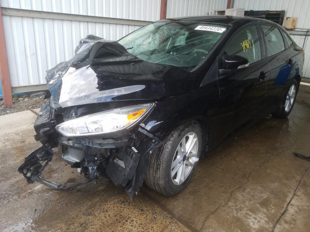 Photo 1 VIN: 1FADP3F21GL389172 - FORD FOCUS SE 