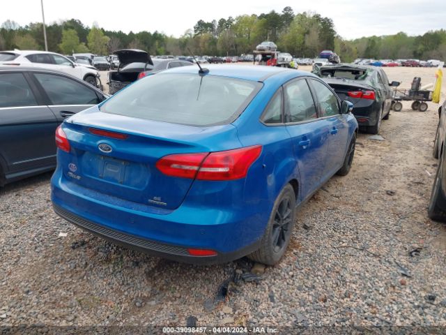 Photo 3 VIN: 1FADP3F21GL390032 - FORD FOCUS 