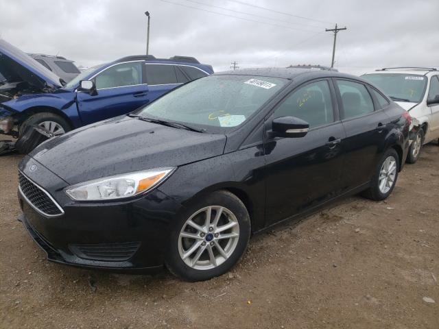 Photo 1 VIN: 1FADP3F21GL390404 - FORD FOCUS 