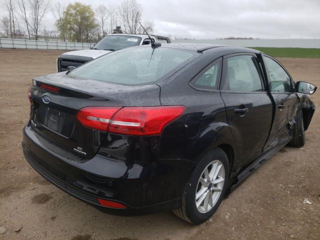 Photo 3 VIN: 1FADP3F21GL390404 - FORD FOCUS 