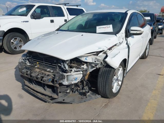 Photo 5 VIN: 1FADP3F21GL391245 - FORD FOCUS 