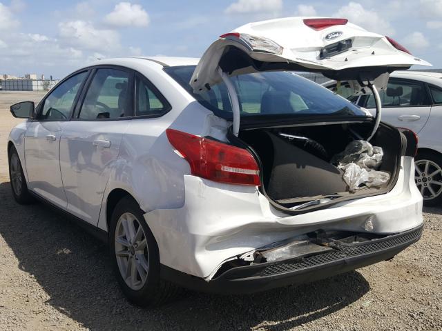 Photo 2 VIN: 1FADP3F21GL392928 - FORD FOCUS 