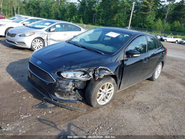 Photo 1 VIN: 1FADP3F21GL401059 - FORD FOCUS 