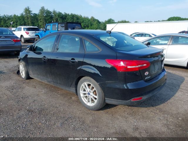 Photo 2 VIN: 1FADP3F21GL401059 - FORD FOCUS 