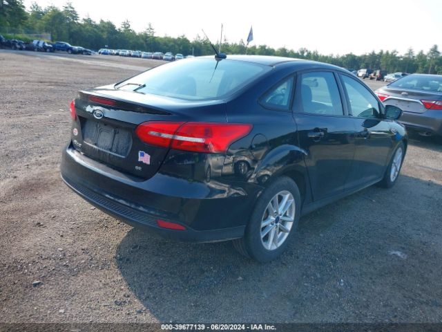 Photo 3 VIN: 1FADP3F21GL401059 - FORD FOCUS 