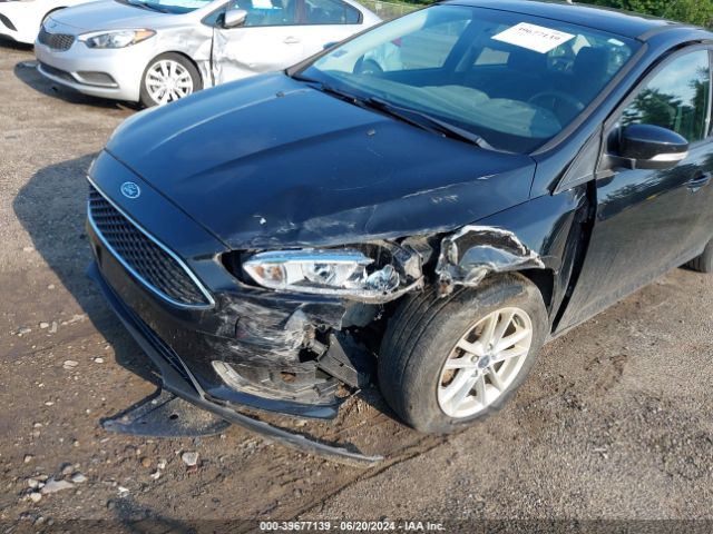 Photo 5 VIN: 1FADP3F21GL401059 - FORD FOCUS 