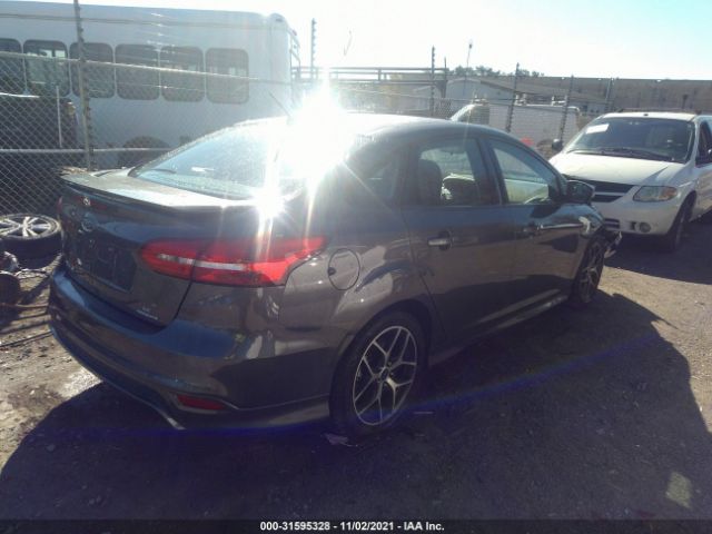 Photo 3 VIN: 1FADP3F21GL403670 - FORD FOCUS 