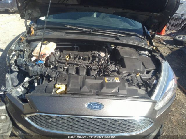 Photo 9 VIN: 1FADP3F21GL403670 - FORD FOCUS 